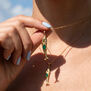 Green onyx fish pendant necklace by Mirabelle